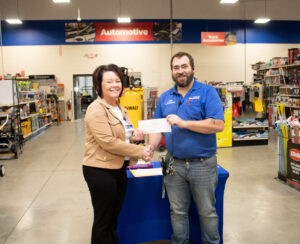 Michelle Paris Accepting Theisen’s Grant Check 110525